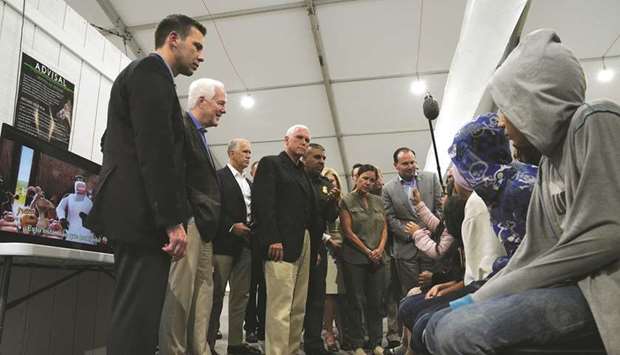 Vice-President Pence speaks with young asylum-seekers at the Donna Soft-Sided Processing Facility in Donna, Texas.