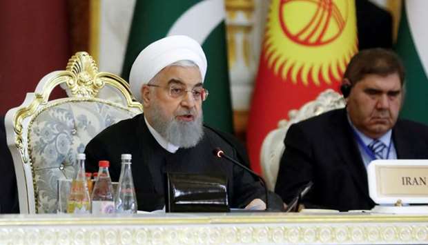 Iranian President Hassan Rouhani delivers a speech at the Conference on Interaction and Confidence-Building Measures in Asia (CICA) in Dushanbe, Tajikistan on June 15