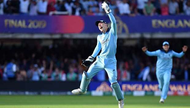 England's Jos Buttler celebrates after they win the super over to win the 2019 Cricket World Cup final between England and New Zealand at Lord's Cricket Ground in London