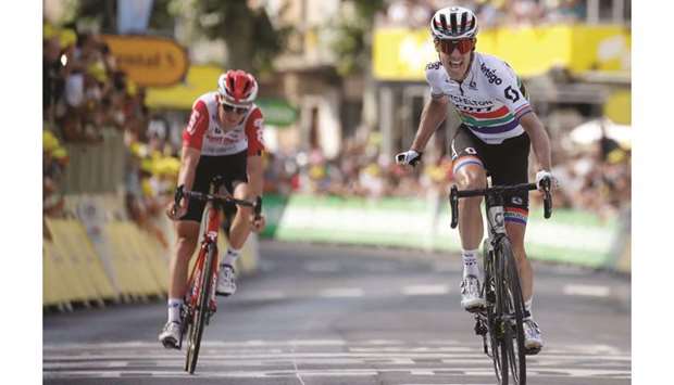 Mitchelton-Scott rider Daryl Impey (right) of South Africa wins the stage nine ahead of Lotto Soudal rider Tiesj Benoot of Belgium during the Tour de France. (Reuters)