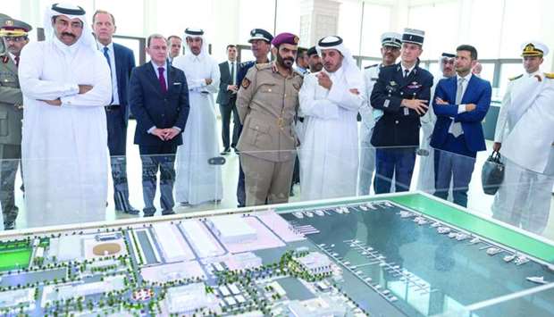 HE the Prime Minister and Minister of Interior Sheikh Abdullah bin Nasser bin Khalifa al-Thani is briefed about the facilities at the base after he formally inaugurated it Sunday
