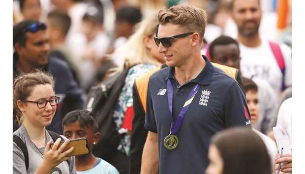 Englandu2019s Jos Buttler with fans during the celebrations of their ICC Cricket World Cup triumph at The Oval in London yesterday. (Reuters)