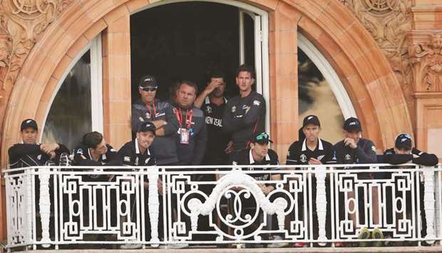 New Zealand players look on from the Lordu2019s balcony during the Super Over in the ICC Cricket World Cup final against England in London on Sunday. (Reuters)