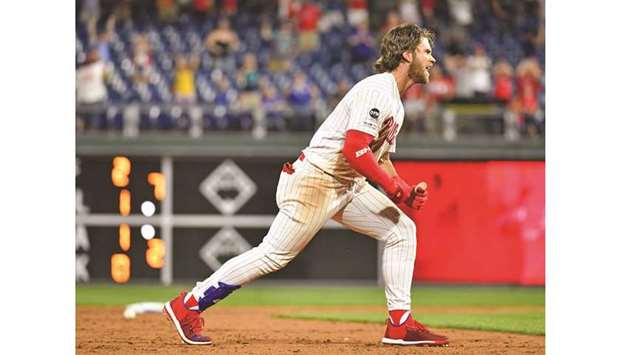 Philadelphia Phillies right fielder Bryce Harper celebrates his walk-off RBI double during the ninth inning against the Los Angeles Dodgers at Citizens Bank Park. PICTURE: USA TODAY Sports