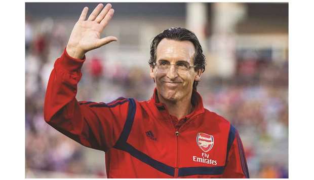 Arsenal manager Unai Emery waves to fans in Commerce City, Colorado.  (AFP)