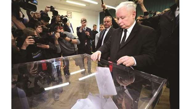 Jaroslaw Kaczynski, leader of the ruling Law and Justice (PiS) party, casts his vote during the European Parliament elections at a polling station in Warsaw, in this May 26, 2019, photograph.