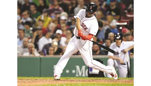 Boston Red Sox third baseman Rafael Devers hits a two RBI double against the Toronto Blue Jays during the fourth inning at Fenway Park. PICTURE: USA TODAY Sports