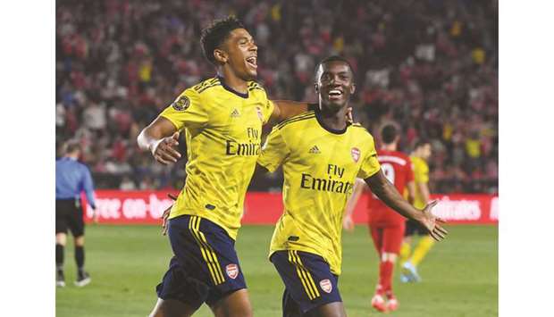 Arsenal Forward Eddie Nketiah (right) celebrates with teammate Tyreece John-Jules after scoring the winner against Bayern Munich during the International Champions Cup  match in Carson, California on Wednesday night. (AFP)