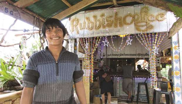 Owner Ouk Vanday poses at the Rubbish Cafe at the Kirirom National Park in Kampong Speu province, Cambodia.