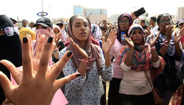 Sudanese protesters chant slogans in the capital Khartoumu2019s Green Square yesterday during a rally to honour comrades killed in the months-long protest movement.