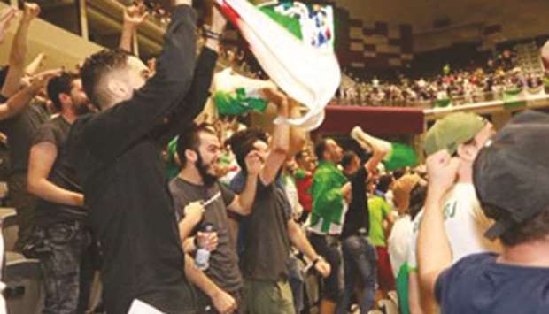 Algerians celebrate Baghdad Bounedjahu2019s goal at Ali Bin Hamad Al-Attiyah Arena, Doha, yesterday.