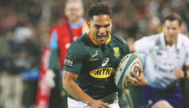 South Africau2019s Herschel Jantjies scores a try against Australia in their Rugby Championship match at the Ellis Park Stadium in Johannesburg yesterday. (Reuters)
