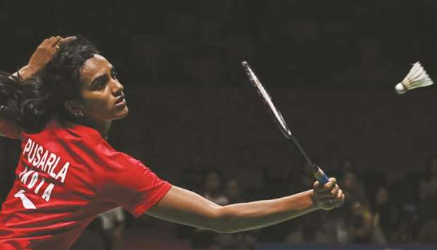 Pusarla Sindhu of India hits a return against Chen Yufei of China during their singles semi-final at the Indonesia Open in Jakarta yesterday. (AFP)