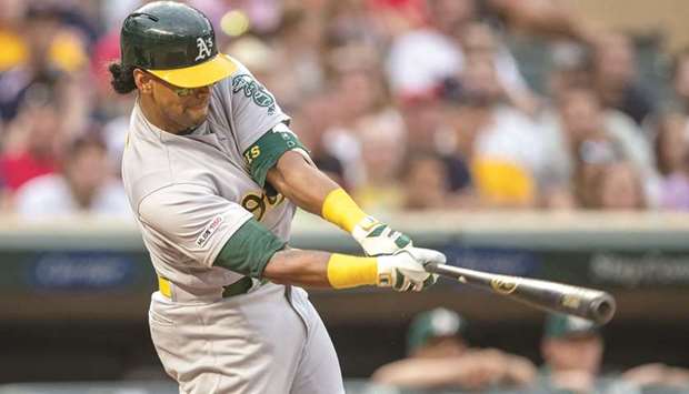 Oakland Athletics designated hitter Khris Davis hits a RBI double against the Minnesota Twins in the fourth inning at Target Field. PICTURE: USA TODAY Sports