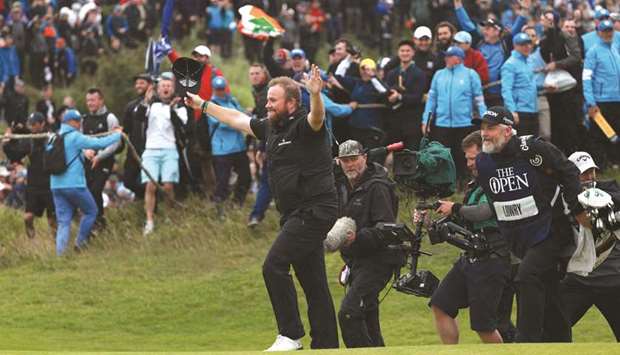 Irelandu2019s Shane Lowry celebrates after winning the British Open golf Championships at Royal Portrush golf club in Northern Ireland yesterday.
