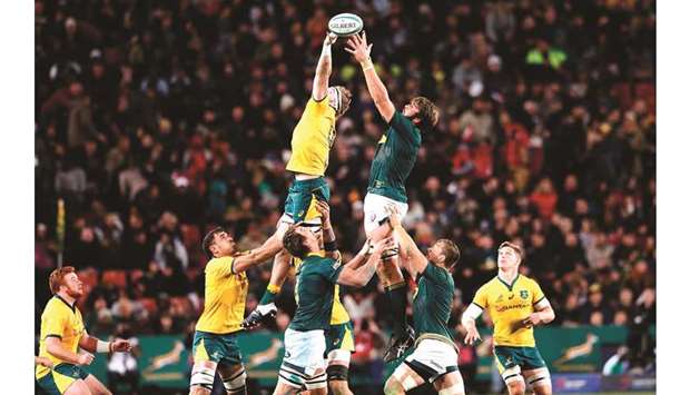 Australiau2019s Izack Rodda (centre left) and South Africau2019s Lood de Jager fight for the ball during their 2019 Rugby Championship match at the Emirates Airline Park in Johannesburg. (AFP)