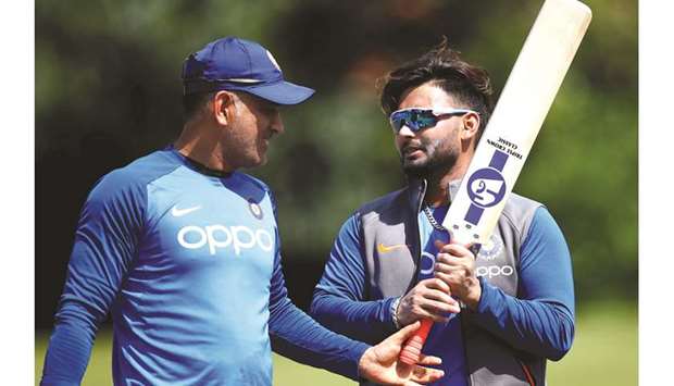 Rishabh Pant (left) will be u2018groomedu2019 as Indiau2019s first choice wicketkeeper with amid intense speculation over Mahendra Singh Dhoniu2019s future. (Reuters)