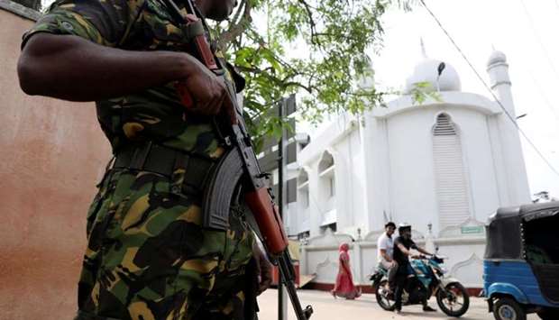 A soldier stands guard outside the Grand Mosque, days after a string of suicide bomb attacks on churches and luxury hotels across the island on Easter Sunday, in Negombo, Sri Lanka April 26, 2019