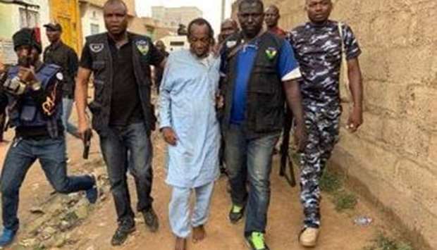 In this photo being shared on social media, Musa Umar is seen with the police after the rescue.