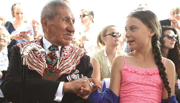 Thunberg with World War II veteran and native American Charles Norman Shay, sponsor of the Freedom Award, after she received the 2019 Normandy u2018Freedom prizeu2019.