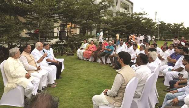 Karnataka BJP president B S Yeddyurappa with BJP MLAs during a meeting at a resort in Bengaluru yesterday.
