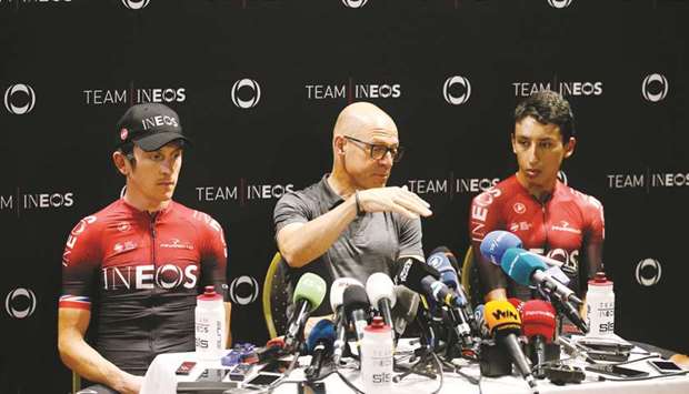 Team Ineos riders Geraint Thomas of Britain (left), Egan Bernal of Colombia and team manager Dave Brailsford (centre) attend a news conference during the second rest day of the Tour de France in Nimes, France. (Reuters)
