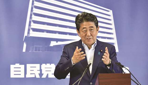 Japanese Prime Minister Shinzo Abe delivers a speech during a press conference in Tokyo.