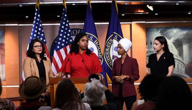 US Representatives Ayanna Pressley (D-MA) speaks as, Ilhan Omar (D-MN)(2R), Rashida Tlaib (D-MI) (R), and Alexandria Ocasio-Cortez (D-NY) look on during a press conference, to address remarks made by US President Donald Trump earlier in the day, at the US Capitol in Washington, DC, on on July 15.