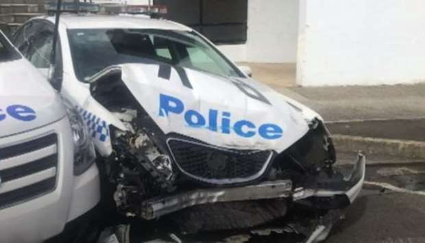 The police patrol car after being hit by the drug-filled van