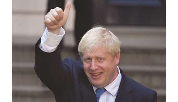 Boris Johnson, leader of the Britainu2019s Conservative Party, leaves the partyu2019s headquarters in London, yesterday.
