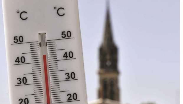 A thermometer placed yesterday outside the church of Belin-Bu00e9liet, southwestern France, shows the temperature.