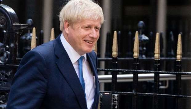 New Conservative Party leader and incoming prime minister Boris Johnson leaves the Conservative party headquarters in central London on July 23