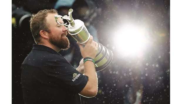 Republic of Irelandu2019s Shane Lowry celebrates with the Claret Jug trophy after winning The Open Championship. (Reuters)