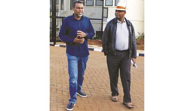 Kenyau2019s Director of Public Prosecutions (DPP) Noordin Haji and Kenyau2019s Director of Criminal investigations (DCI) George Kinoti walk after a meeting in Nairobi.