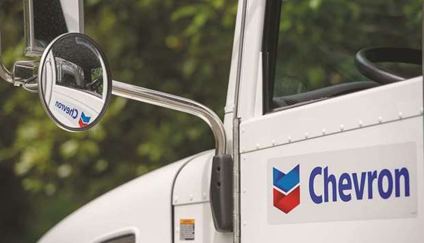 The Chevron Corporation logo is seen on the door of a truck in Richmond, California.