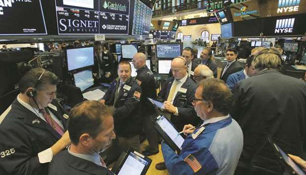 Traders work on the floor at the New York Stock Exchange (file).