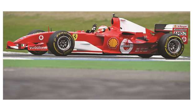German driver Mick Schumacher, son of former champion Michael, drives his fatheru2019s last title winning Ferrari F1 car, the F2004 at the Hockenheim racing circuit in southern Germany yesterday. (AFP)