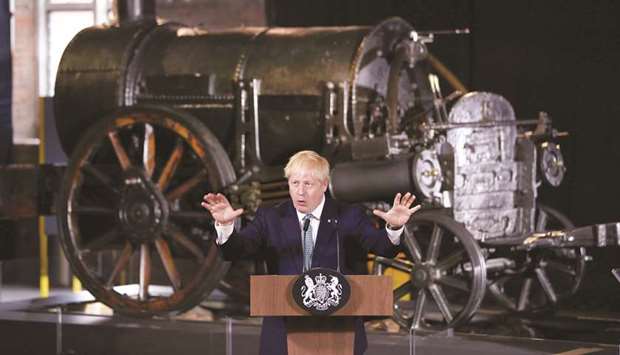 Johnson gestures during a speech on domestic priorities at the Science and Industry Museum in Manchester.