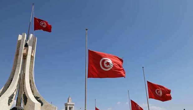 Tunisian flags fly at half-mast in honor of late Tunisian President Beji Caid Essebsi, in Tunis, Tunisia