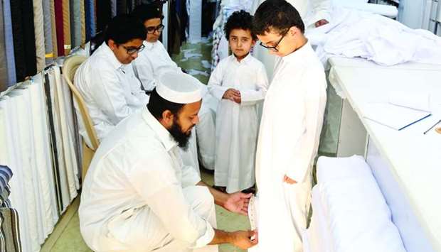 Hectic activity at tailoring shops in Souq Al Ali