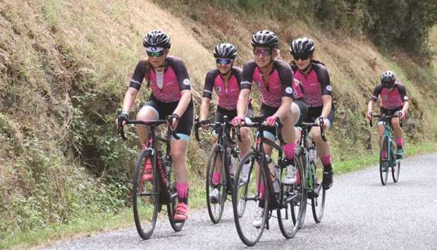 In this July 12, 2019, picture taken from social media, members of Internationelles, a team of female cyclists, are seen during Stage 8 of the Donnons des Elles au Velo J-1 event in France. (Reuters)