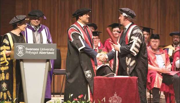 HE the Minister of State Ahmad Mohamed al-Sayed being award an honorary doctorate.