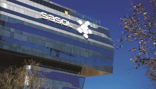 A logo sits on display outside the Sasol headquarters in Johannesburg. Sasol said some of its South African plants are under threat from sulphur dioxide emission standards that it will need to comply with by 2025.