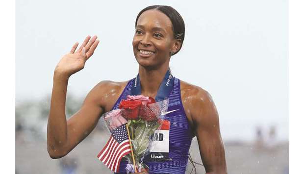 Dalilah Mohamed waves to the crowd after setting the world record in the 400m hurdles during the 2019 USATF Outdoor Championships at Drake Stadium in Des Moines, Iowa, on Sunday. (Getty Images/AFP)