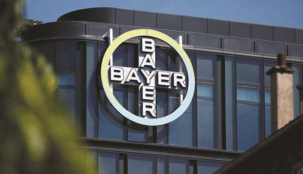 The Bayer AG logo is seen on at facade of the companyu2019s headquarters in La Garenne-Colombes, near Paris.