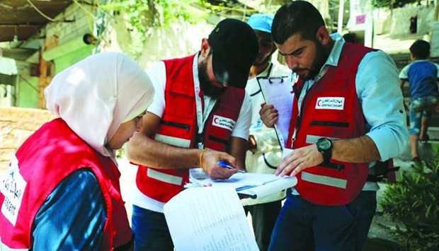 The Qatar Red Crescent Society (QRCS) personnel monitoring the polio vaccination campaign in Syria.