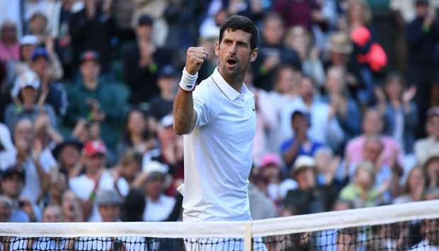 Serbiau2019s Novak Djokovic celebrates beating US player Denis Kudla on the third day of Wimbledon yesterday.