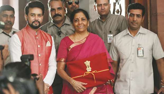 Finance Minister Nirmala Sitharaman arrives to present the 2019 budget in Parliament, New Delhi, yesterday.