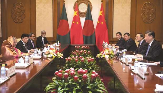Chinese President Xi Jinping attends a meeting with Bangladeshi Prime Minister Sheikh Hasina at the Diaoyutai State Guesthouse in Beijing yesterday.