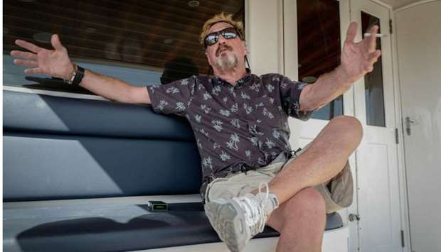 US millionaire John McAfee gestures during an interview with AFP on his yacht anchored at the Marina Hemingway in Havana